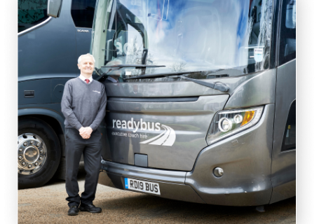 Driver in front of bus